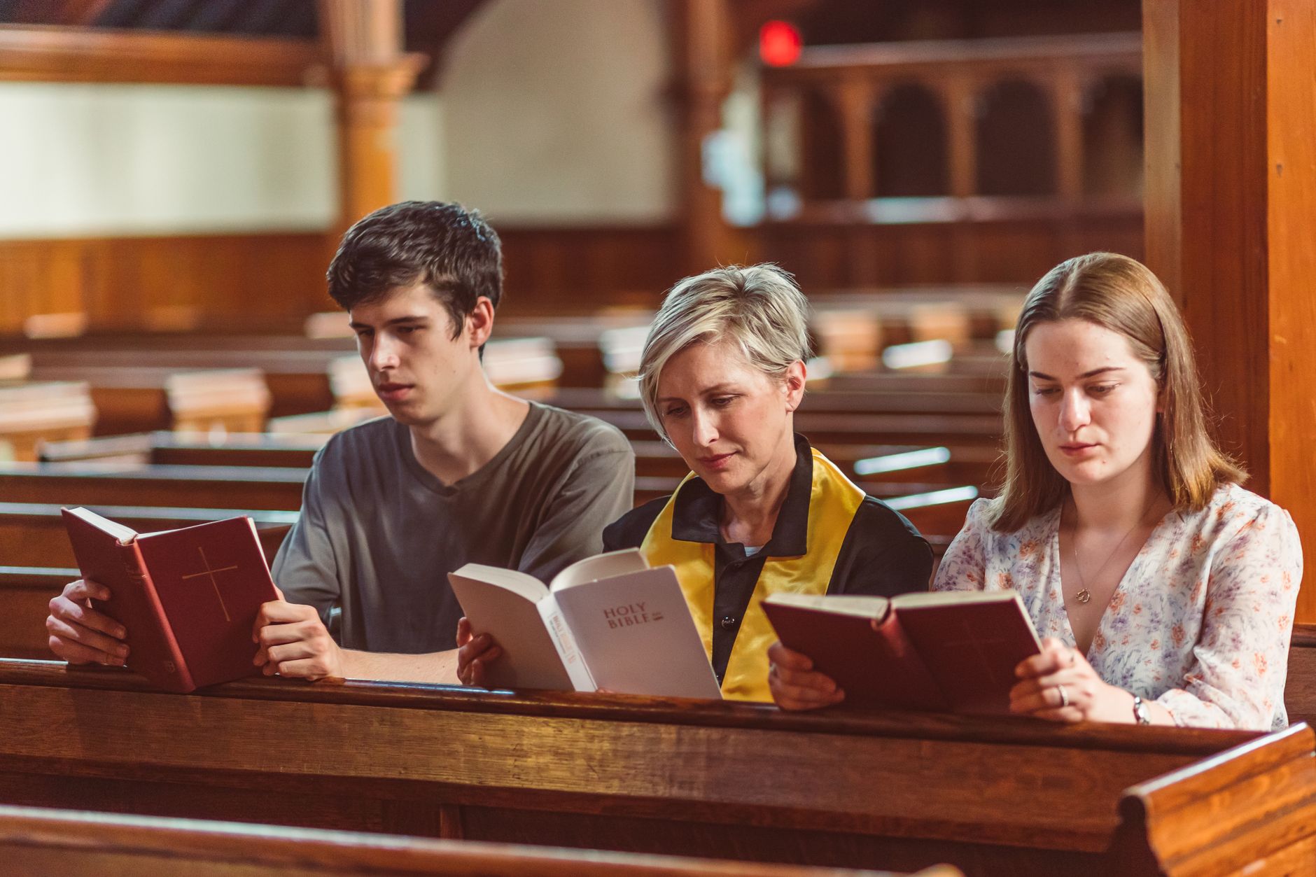 A family reading the Bible together at home