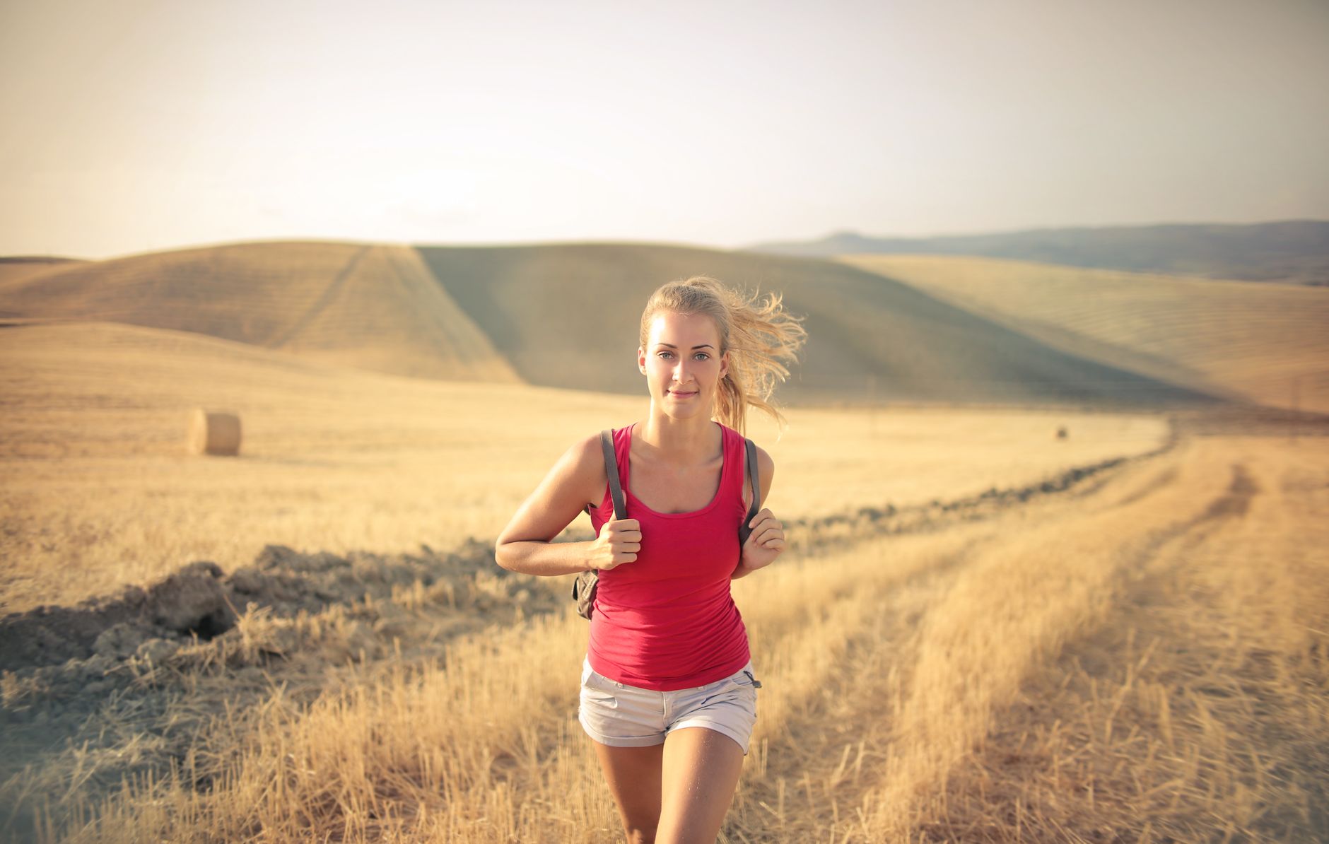 A runner at sunrise — pressing forward when your own strength runs out