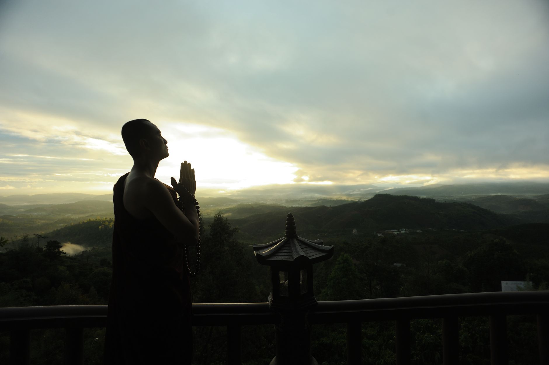 Man praying at sunrise, seeking God before the day gets loud